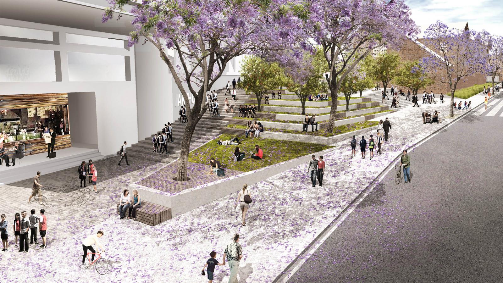 A vibrant urban park in Parramatta features people walking, sitting, and socializing amidst blooming jacaranda trees with purple flowers. The park has tiered seating, grassy areas, and a nearby café. The adjacent street near Arthur Phillip School is busy with pedestrians and cyclists.