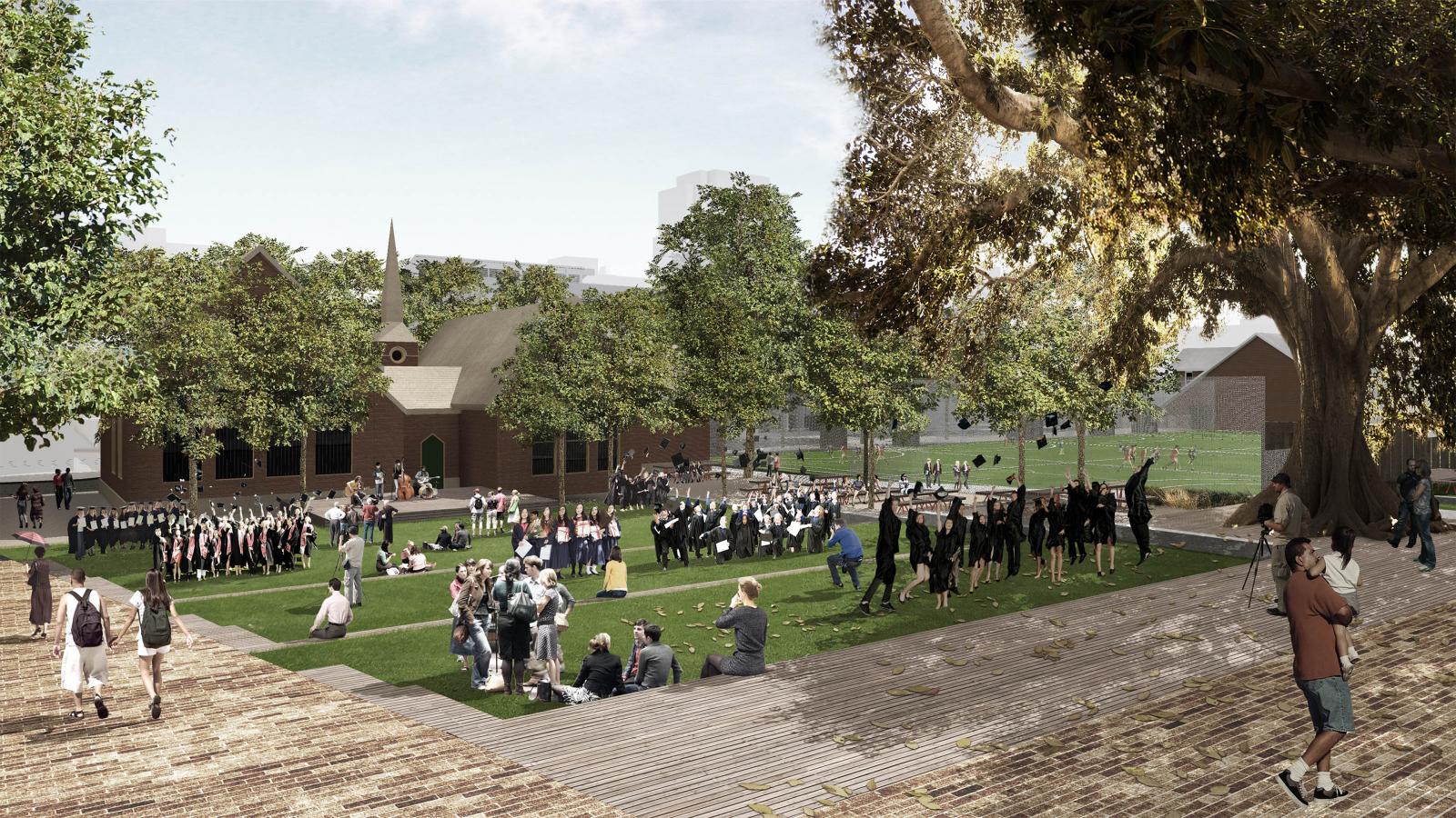 A lively outdoor scene at Arthur Phillip School's Parramatta campus features students in graduation gowns, people sitting on grass, and others walking around. A historic building with a steeple and brick pathways are visible in the background, surrounded by lush green trees.