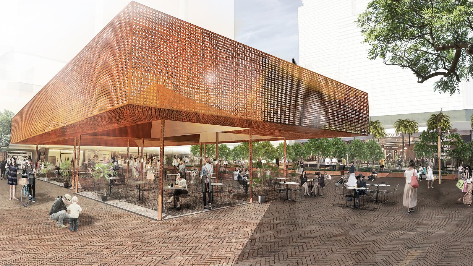 An outdoor plaza with a modern, elevated structure covered in perforated metal. People are seated at tables, walking, and socializing. Surrounding the plaza are trees and a garden area, creating a lively and inviting atmosphere that once was home to the Former Cumberland News site.