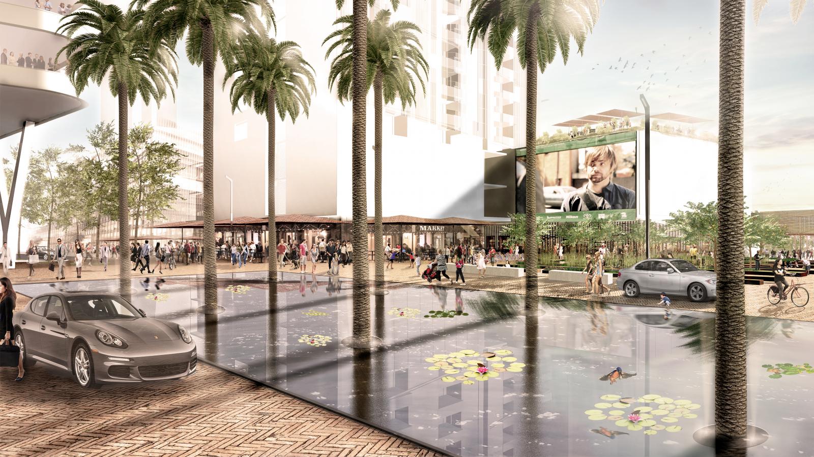 A busy, modern urban plaza featuring tall palm trees and a reflective water feature with lily pads. People walk and gather, some sitting on benches. Cars and bicycles share the space. In the background, a large digital screen displays an image at what used to be the Former Cumberland News Site.