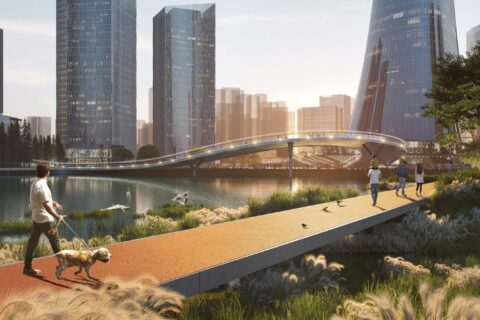 A futuristic cityscape with tall, sleek skyscrapers, interconnected by a sleek pedestrian bridge over a serene body of water. People walk and jog along a riverside path near the Foshan Arts Centre, one person seen walking a dog. Grassy areas and green trees surround the walkway.