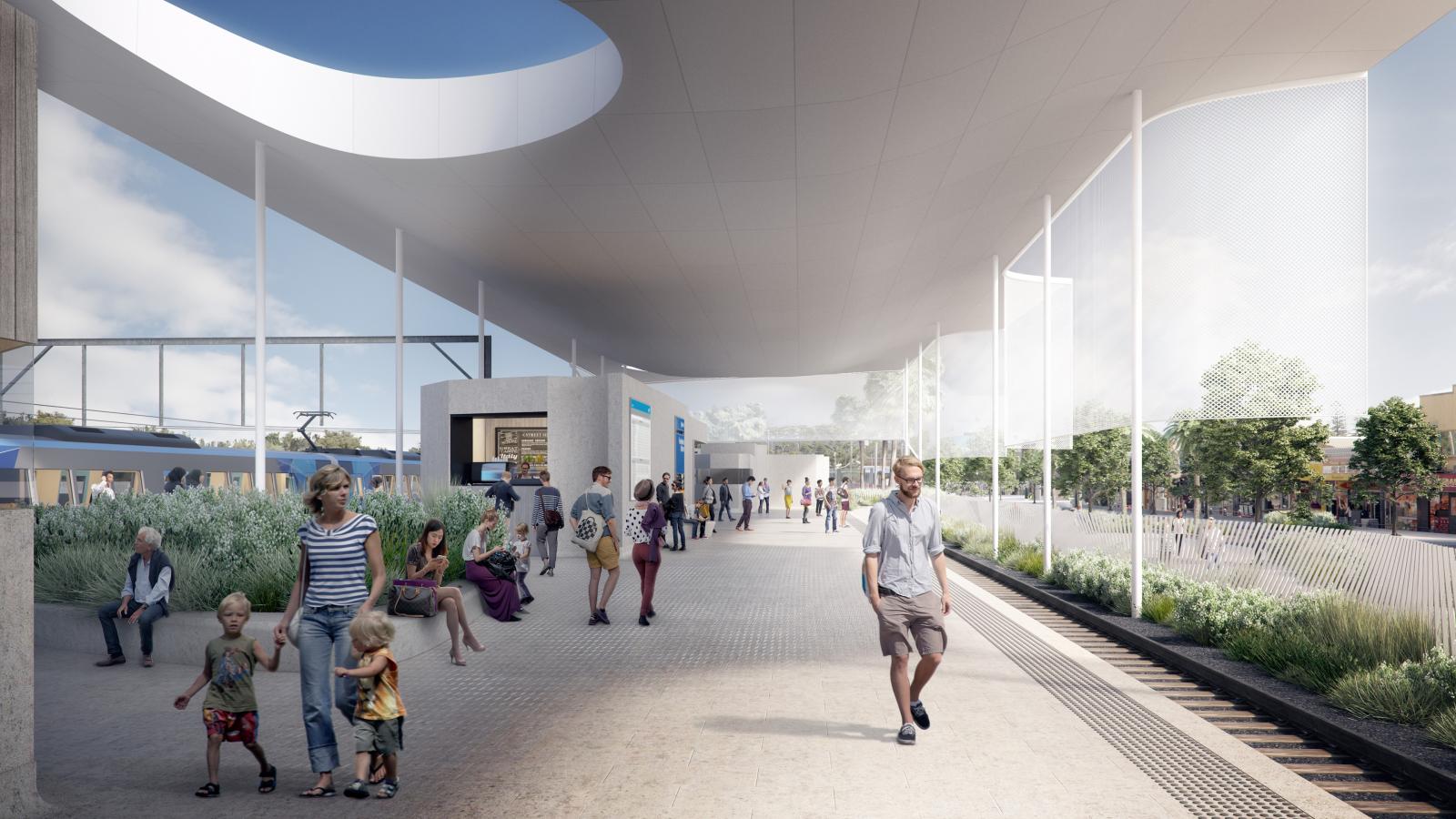 A modern outdoor transportation terminal with a sleek, curved roof featuring circular openings. People are walking, waiting, and sitting, including children. A train is visible on the left, and the background shows greenery and clear blue skies—a testament to innovative station design in Frankston.