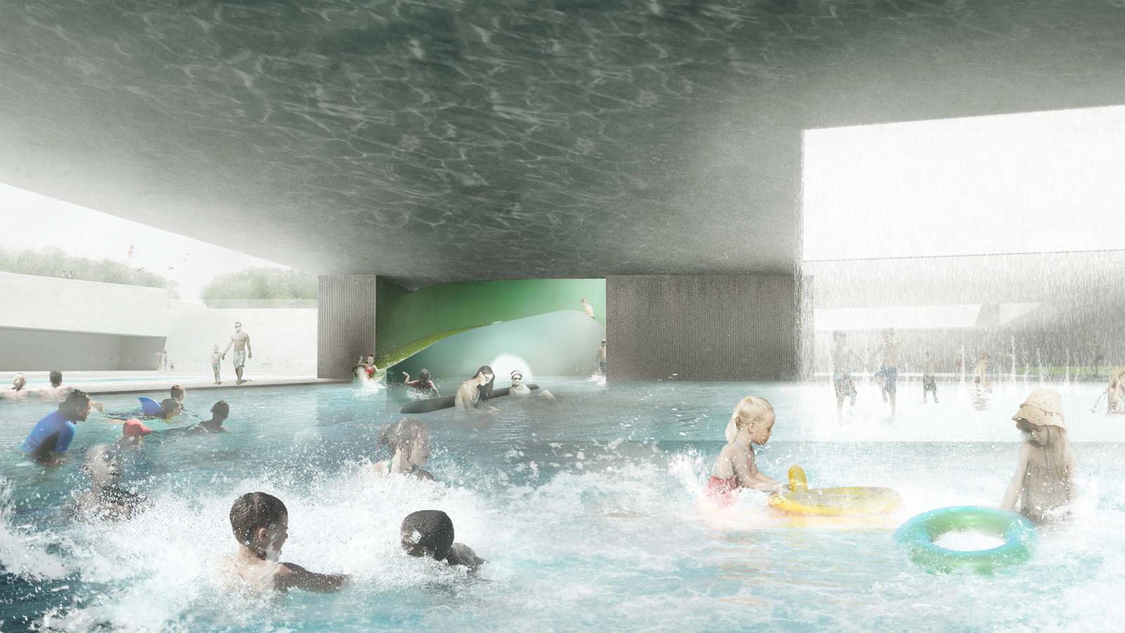 People enjoying an indoor water park at Gunyama Park Aquatic Centre. Children and adults swim and play in the large pool. Some use inflatable rings while others splash water. The background features a water slide and a large pouring fountain. Bright, natural light filters in from openings.