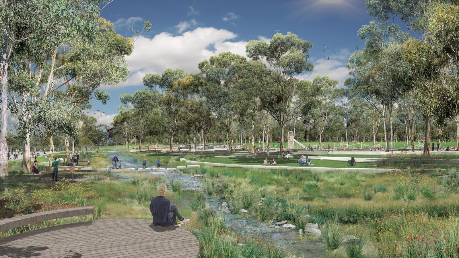 Lewis Park, a serene scene with green open spaces and trees, comes alive with people walking, biking, and sitting near a flowing stream crossed by small bridges. A clear blue sky overhead enhances the peaceful atmosphere of this beautifully designed masterplan.