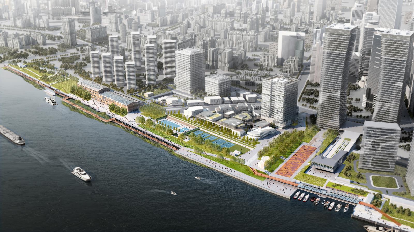 Aerial view of the modern urban waterfront at Lujiazui with high-rise buildings, green spaces, and Waterfront Park. Boats are docked along the shoreline, and people are walking on the promenade. The cityscape extends into the distance with numerous tall structures.