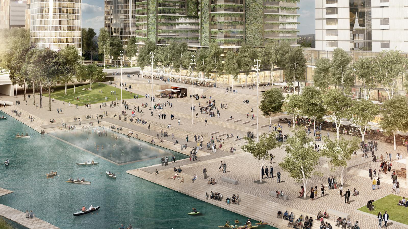 An open urban plaza in the heart of Parramatta features a large rectangular water basin where people are kayaking. The surrounding area is bustling with pedestrians, trees, and modern high-rise buildings with green facades. Some people are sitting or walking on paved pathways, while others gather in groups.