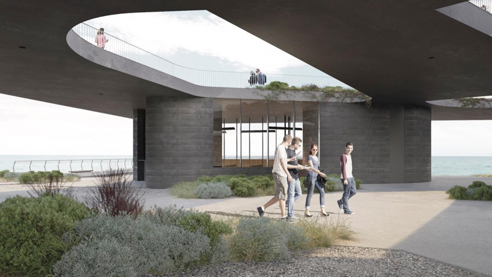 A group of people walks by the modern architectural structures of Point Grey, featuring open spaces and large, circular cutouts. The building's design showcases dark, sleek materials, complemented by plants and bushes in the foreground with the ocean visible in the background.