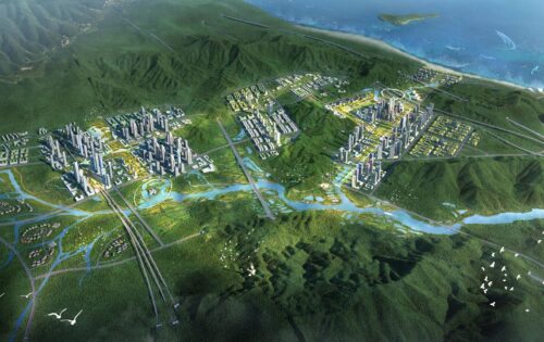 A detailed aerial view of Shenshan BioCity, an extensive, futuristic biohub integrated with lush greenery. Skyscrapers and residential buildings are dispersed among verdant hills, connected by roads, bridges, and waterways. The city is bordered by mountains and a body of water.