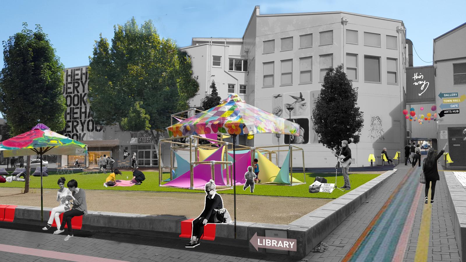 A vibrant public space in Wollongong features colorful umbrellas, a green lawn, and playground structures with children playing, while adults relax on benches. A mural adorns a building on the left, with a "Library" sign pointing right. People walk along the rainbow-painted pathway, enjoying public life.