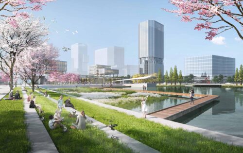 A modern park near the Luhua River, surrounded by blooming cherry blossom trees, epitomizes expert landscape planning. People are sitting on the grass, walking, and enjoying the environment. Skyscrapers form the backdrop under a clear blue sky as a wooden walkway extends over the water.