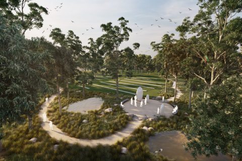 A serene park, masterplanned with winding pathways through lush greenery, features a central sculpture with a group of people gathered around. Two small ponds and tall trees enhance the landscape, while birds fly overhead and scattered stones and grasses add to the natural beauty.