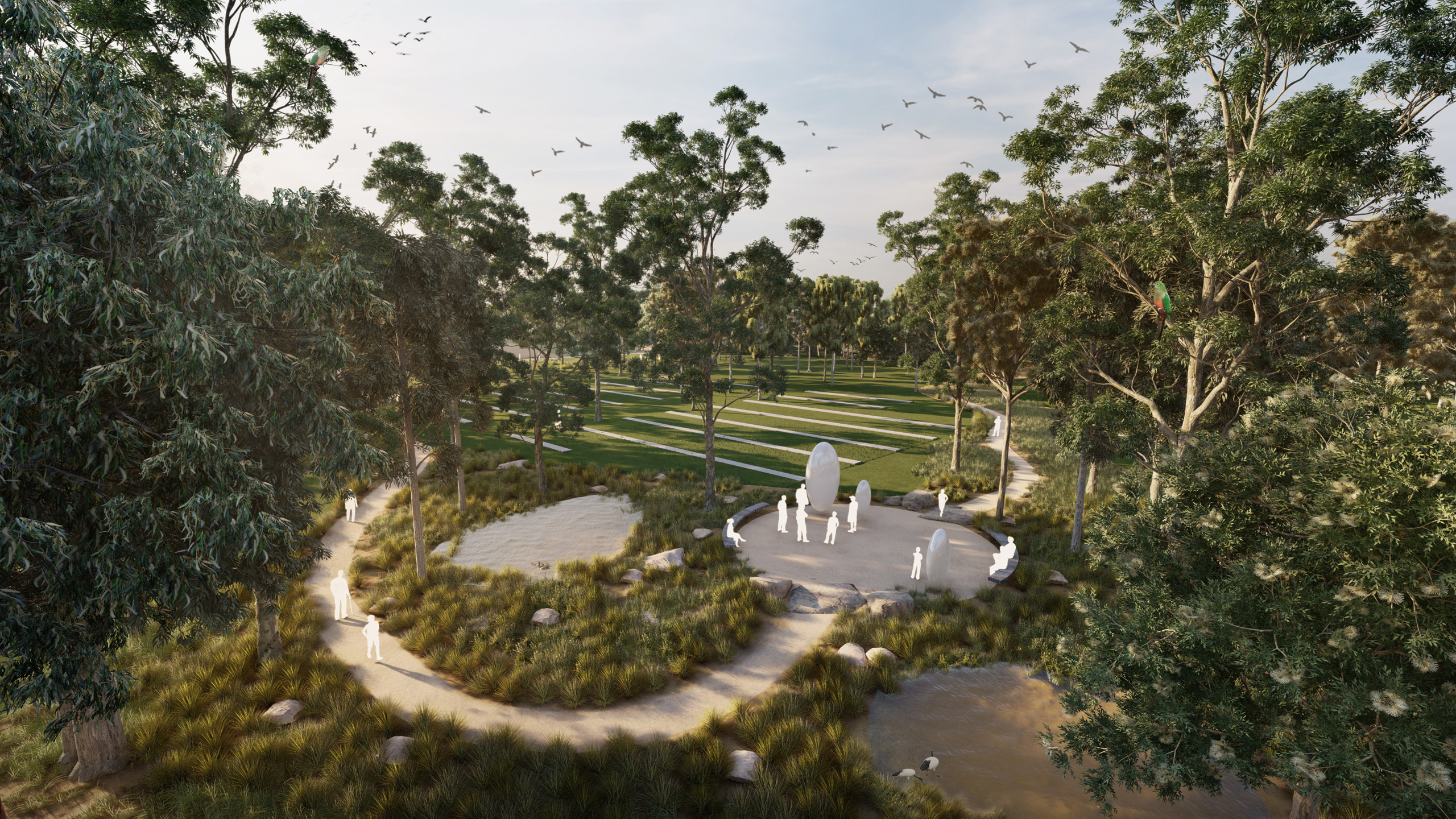 A serene park, masterplanned with winding pathways through lush greenery, features a central sculpture with a group of people gathered around. Two small ponds and tall trees enhance the landscape, while birds fly overhead and scattered stones and grasses add to the natural beauty.