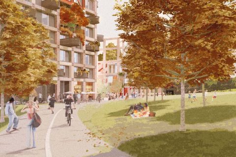 A lively scene at Castle Park with people walking, cycling, and sitting on the grass beneath autumn foliage. A modern, multi-story building adorned with balconies and plants stands on the left. The atmosphere is warm and vibrant, capturing the essence of a sunny fall day.