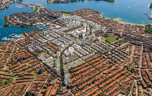 Aerial view of Mosman, a large coastal city with densely packed buildings, marinas, and boats. Modern white structures and red-roofed houses line winding roads and waterways, revealing an alternate plan in urban design.
